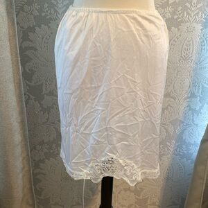 White gourmet with the lace at the bottom 100% Nylon Made in Canada